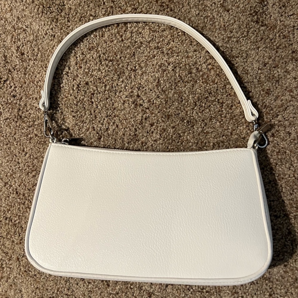 Plain white shoulder bag with silver detailing